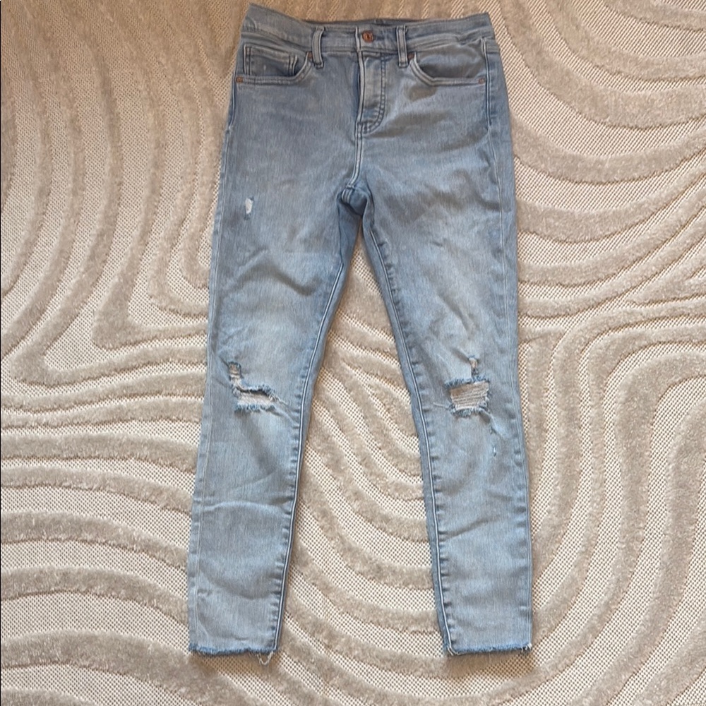 Express Blue Skinny Jeans with Distressed Style